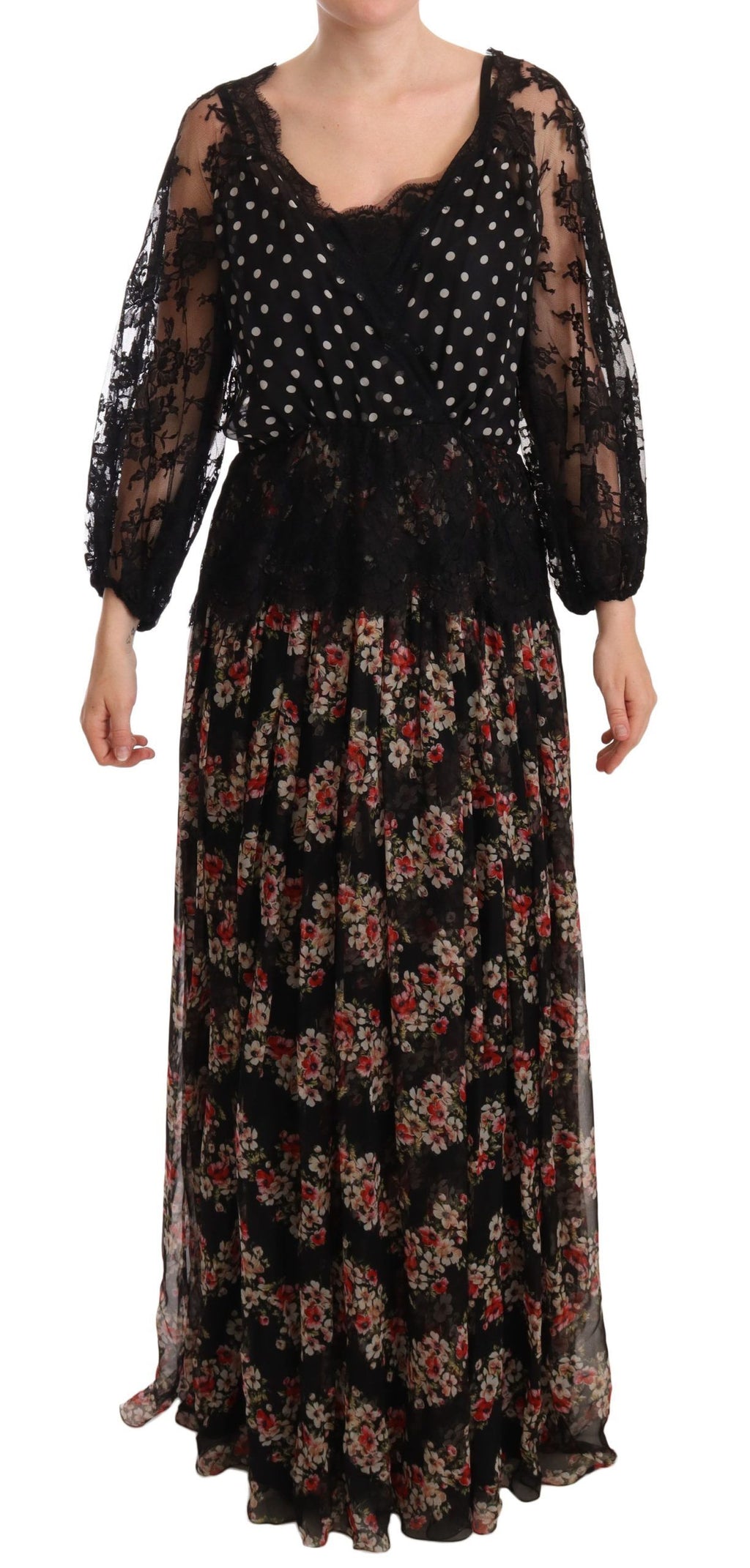 Robe longue noire Dolce & Gabbana en dentelle florale à pois, maxi et élégante, avec détails sophistiqués.