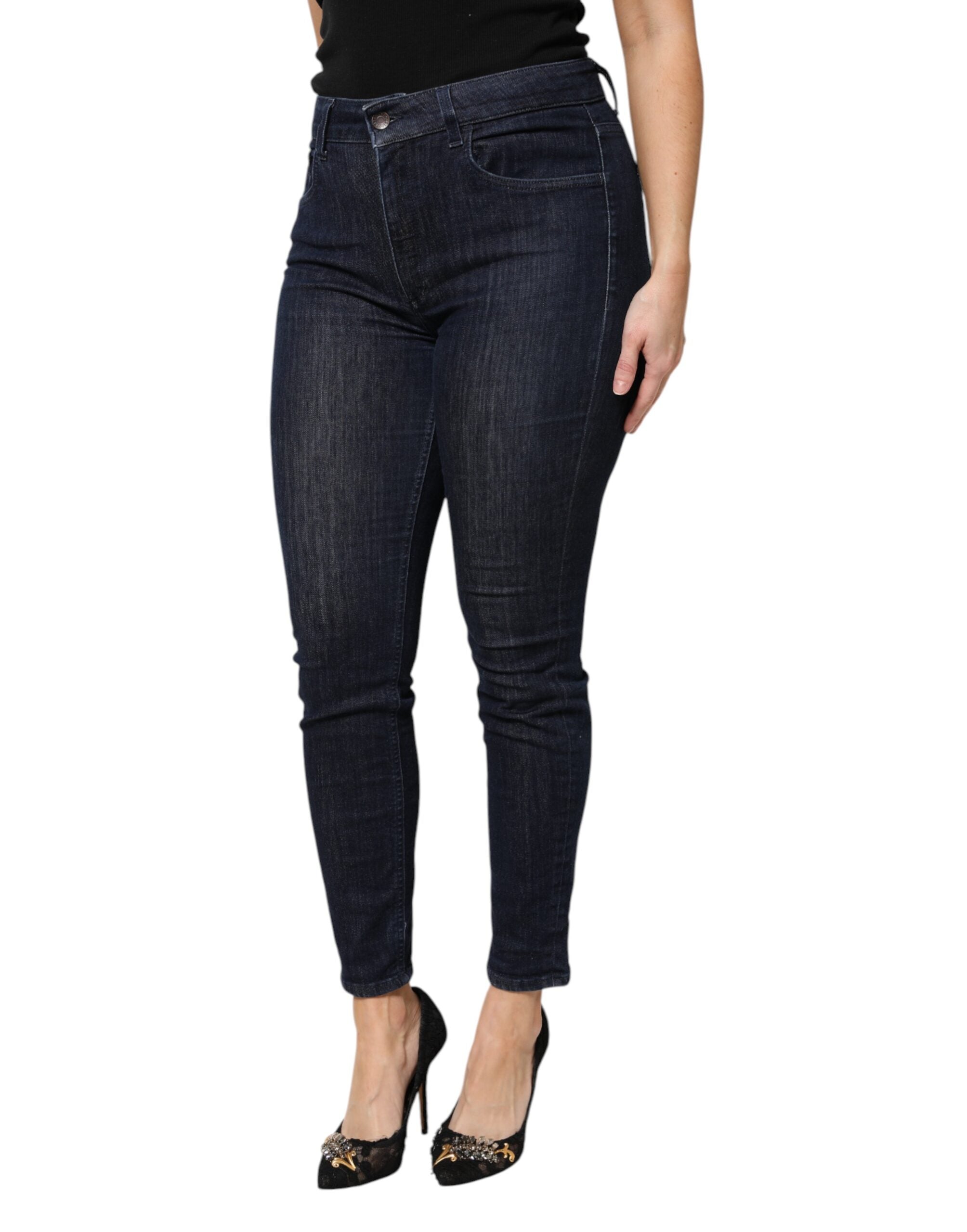 Jeans slim en denim coton bleu foncé de Dolce & Gabbana, coupe cropée et ajustée, avec détails modernes.