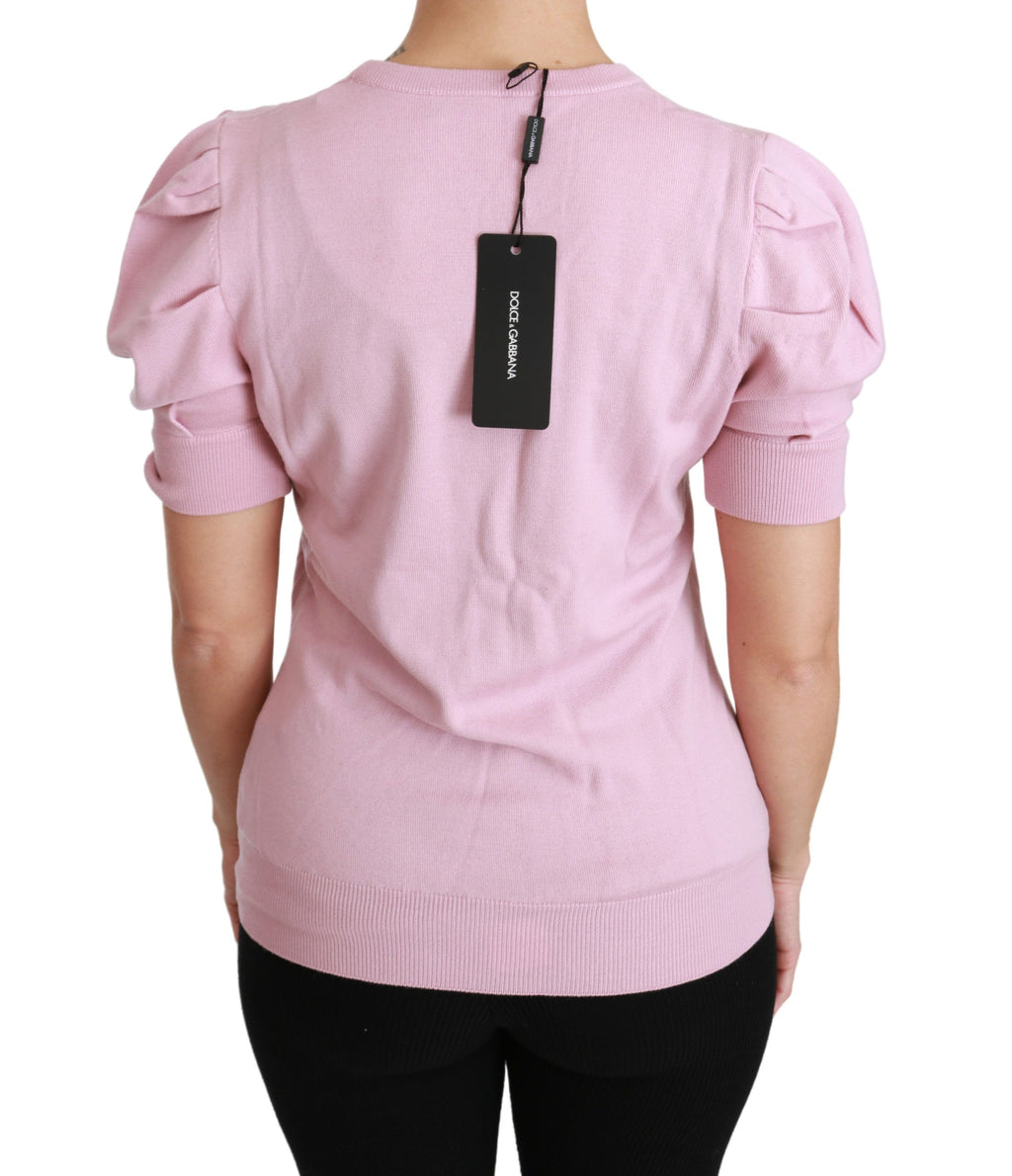 Blouse en laine rose Dolce & Gabbana à broderies florales, style élégant et féminin.