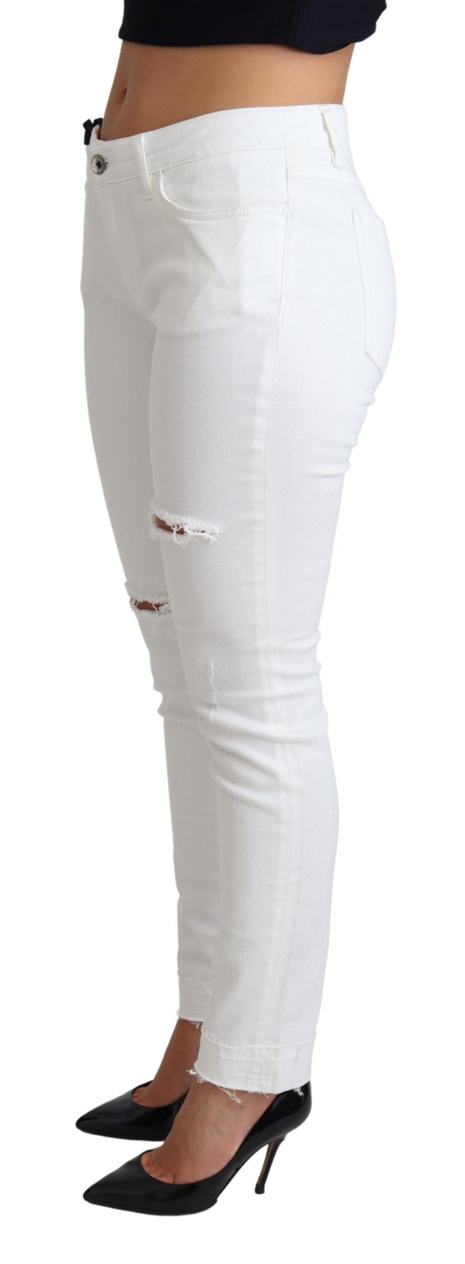 Jeans skinny déchirés en coton stretch blanc de Dolce & Gabbana, style décontracté et tendance.