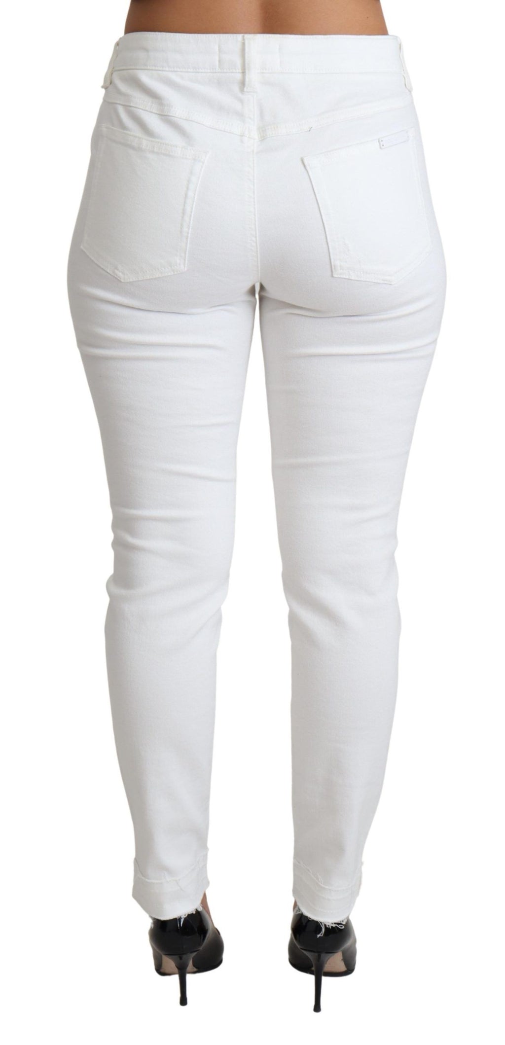 Jeans skinny en denim blanc tattered de Dolce & Gabbana, coupe ajustée, en coton stretch avec déchirures à l'aspect décontracté.
