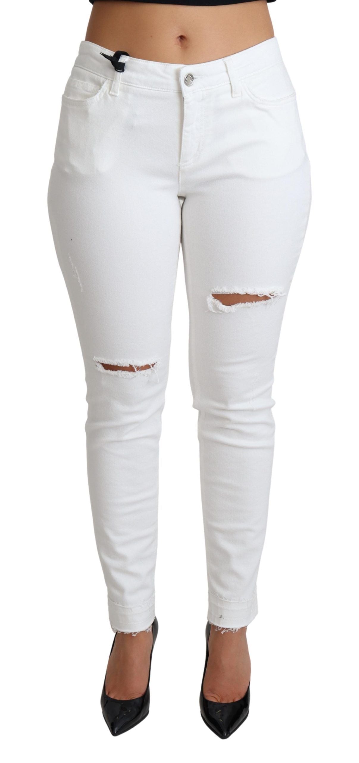 Jeans skinny déchirés en denim blanc Dolce & Gabbana, extensible, avec détails usés et coupe ajustée.