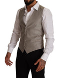 Gilet beige en laine Dolce & Gabbana à un seul bouton, coupe élégante et sophistiquée pour homme.