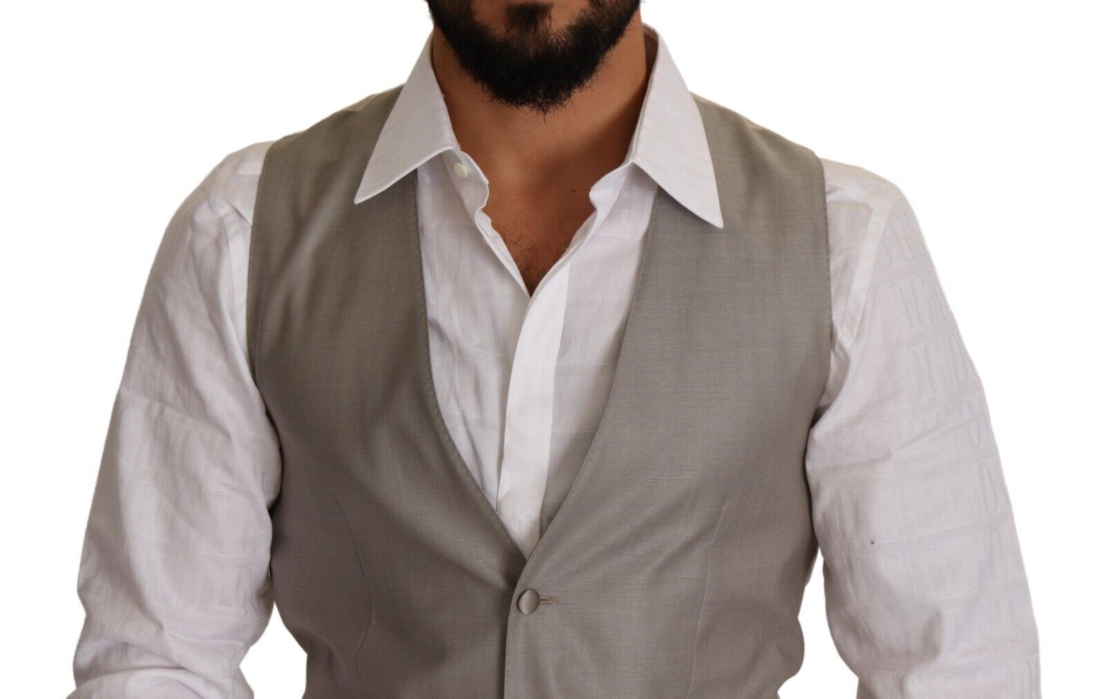 Gilet beige en laine Dolce & Gabbana à un bouton, coupe classique, porté sur un fond neutre, détail de la texture en laine.