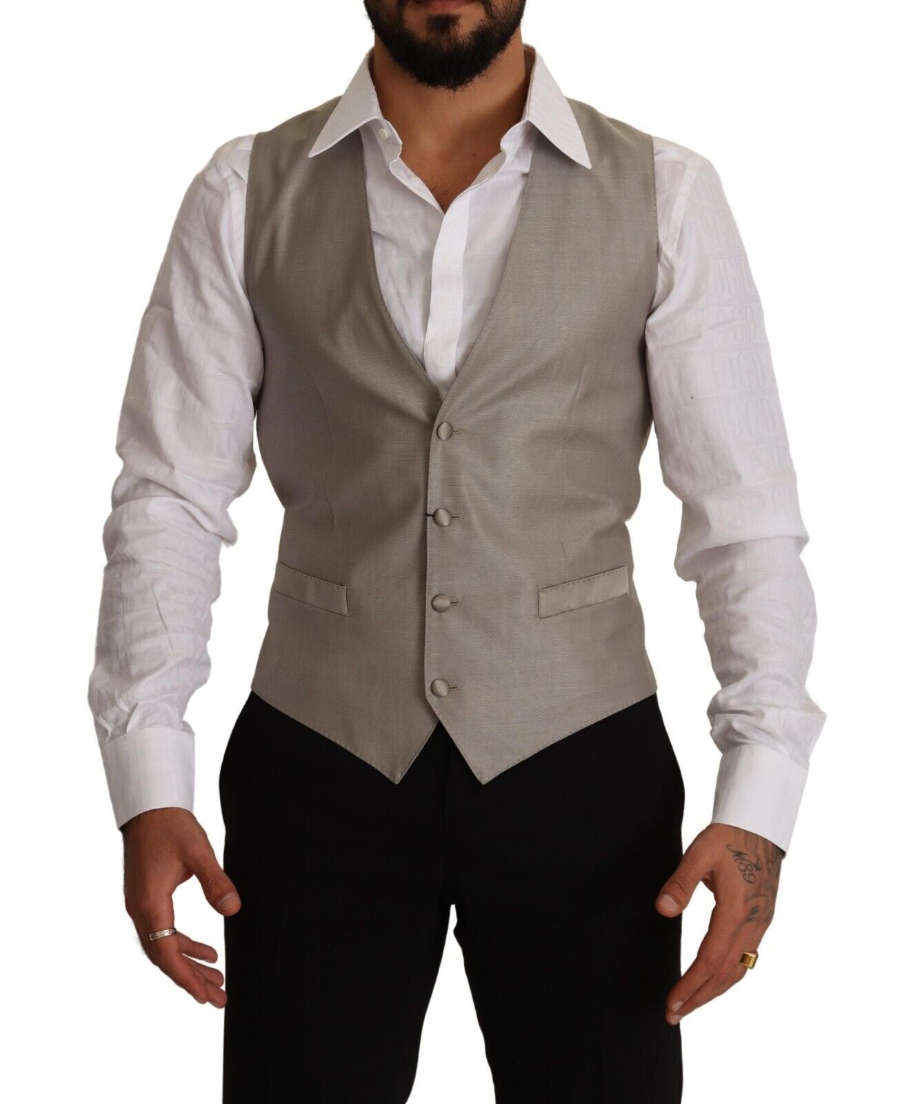 Gilet beige en laine Dolce & Gabbana à boutonnière simple, élégant et sophistiqué, porté sur un mannequin.
