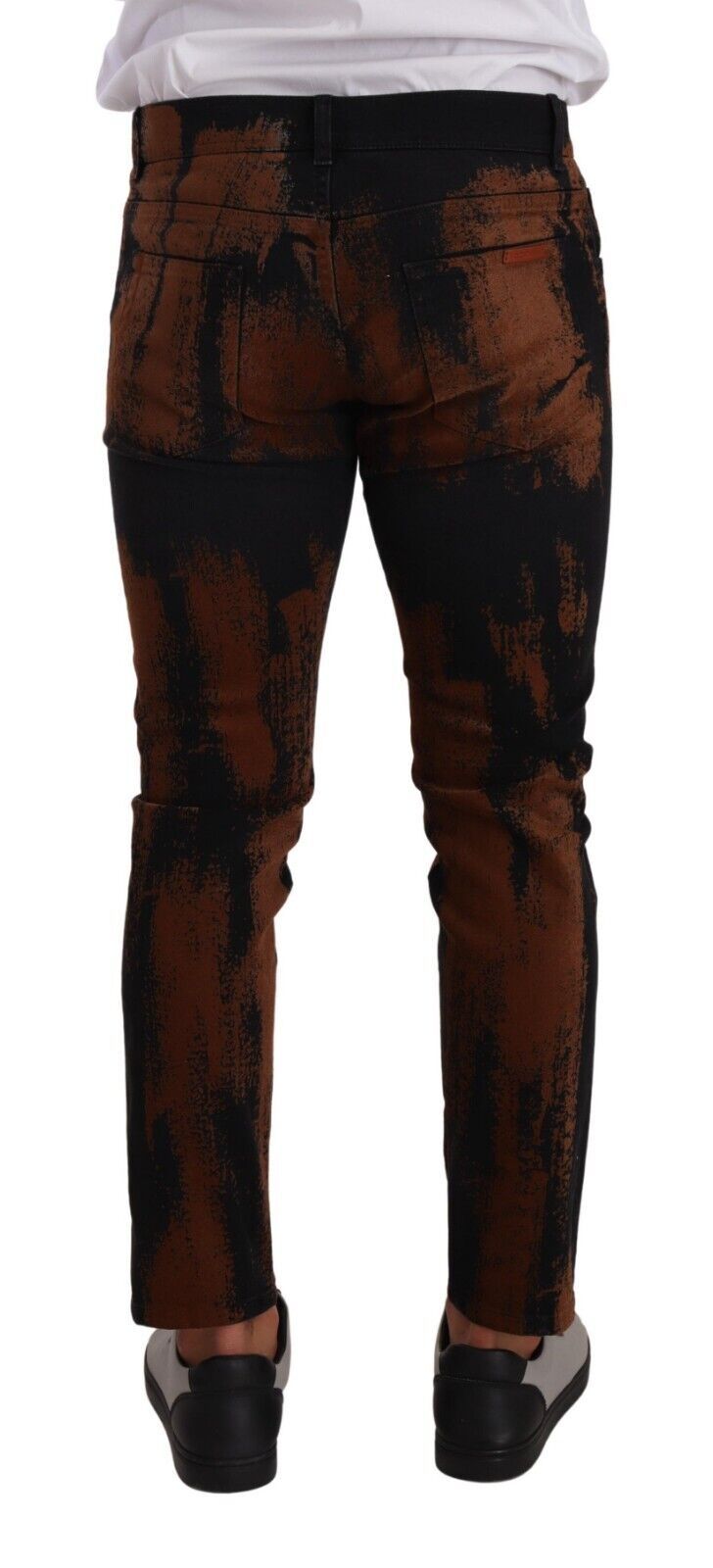 Jeans skinny en denim coton tie-dye noir et marron de Dolce & Gabbana, style moderne et tendance.