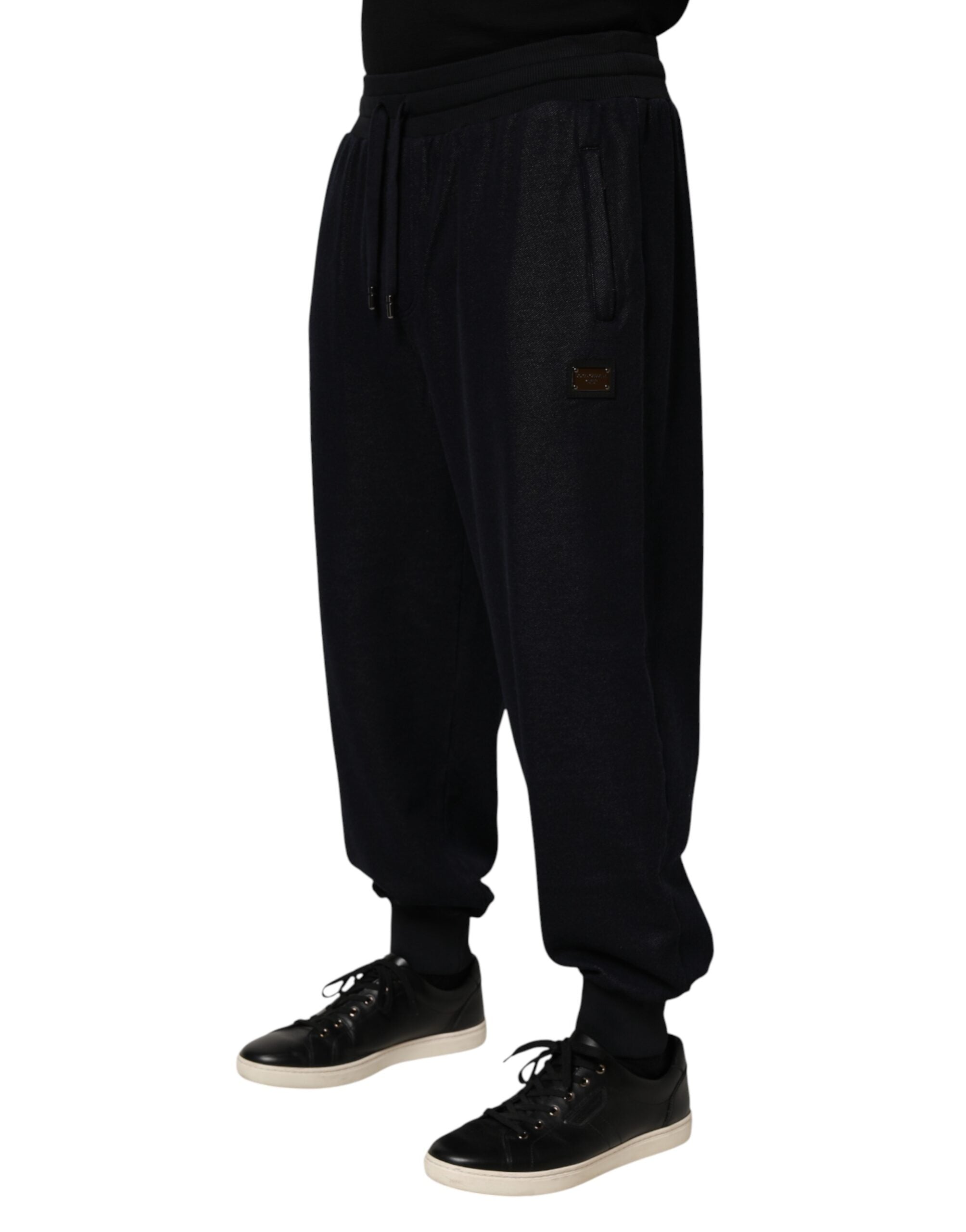 Pantalons jogging Dolce & Gabbana en coton mélangé noir avec cordons de serrage, style décontracté et élégant.