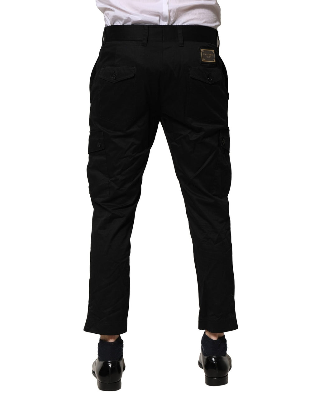 Pantalon slim en coton noir de la marque Dolce & Gabbana, costume formel pour femme, visible sur l'image.