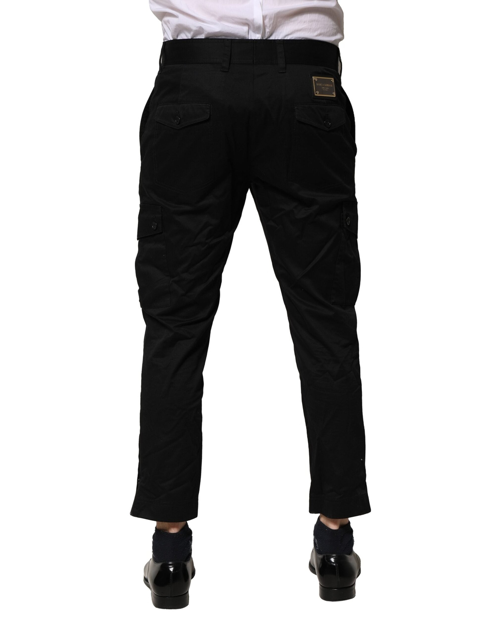 Pantalon slim en coton noir de la marque Dolce & Gabbana, costume formel pour femme, visible sur l'image.