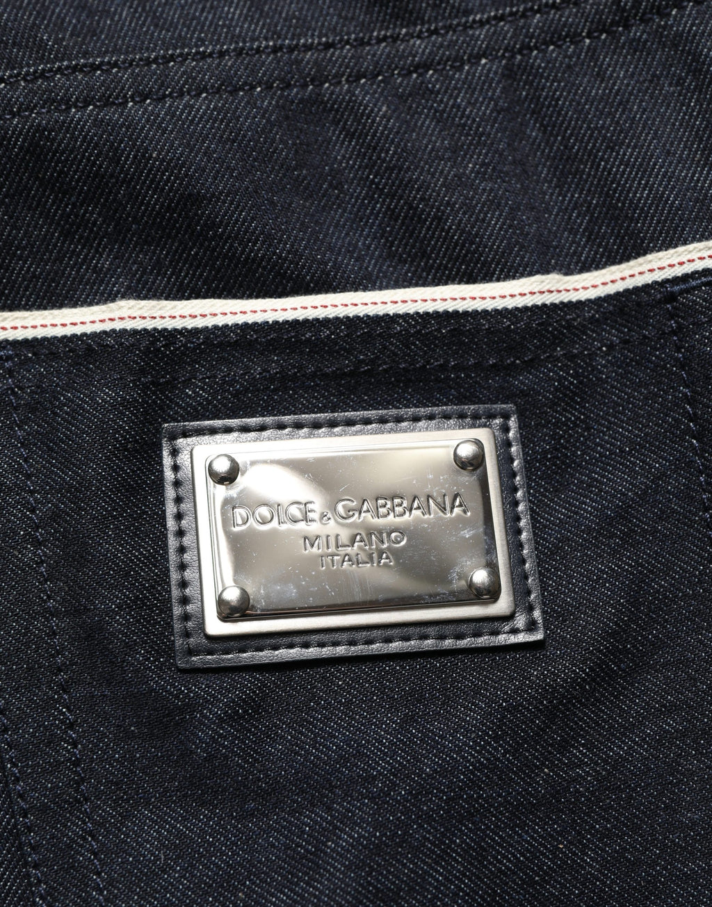 Jeans homme Dolce & Gabbana en coton noir, coupe classique, taille mi-haute, denim de style intemporel.