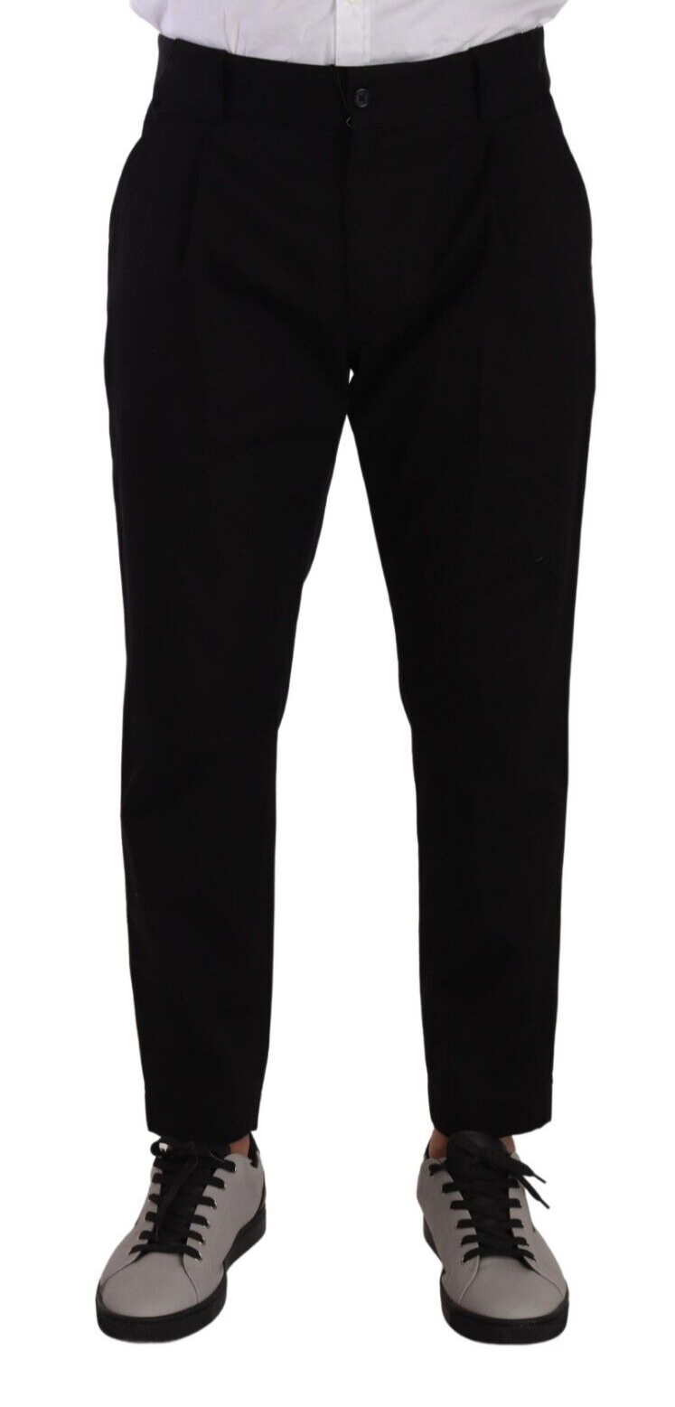 Pantalon chino Dolce & Gabbana en coton stretch noir, style décontracté avec coupe slim, visible dans l'image.