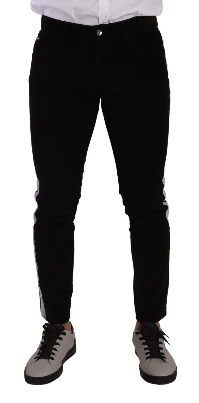 Jean skinny en velours côtelé noir en coton stretch de Dolce & Gabbana, ajusté et élégant.