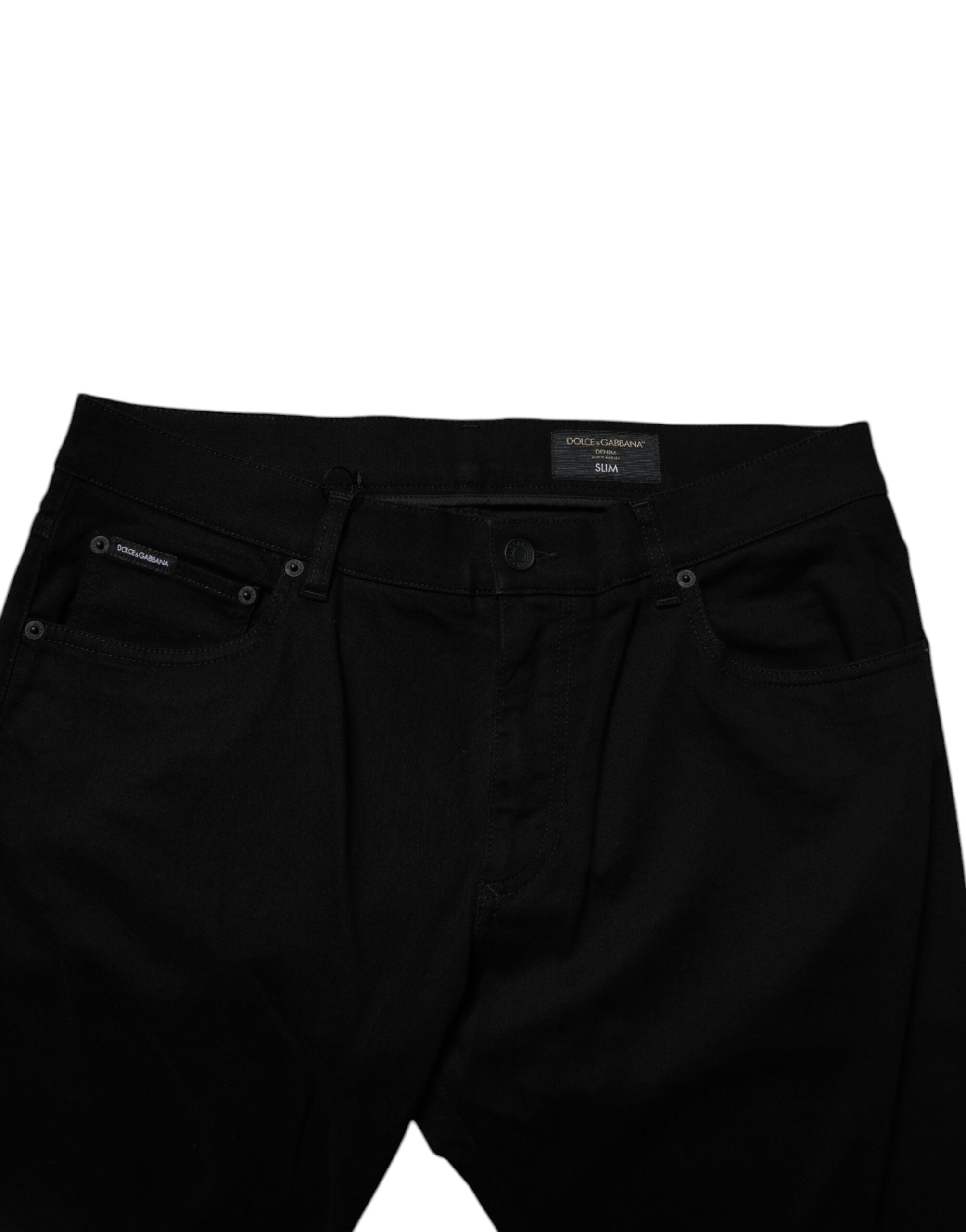 Jeans homme en denim stretch noir Dolce & Gabbana, coupe skinny, en coton, visible avec détails de couture.