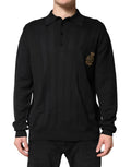 Pull à manches longues Dolce & Gabbana en noir avec un motif de blason, style élégant et classique pour homme.