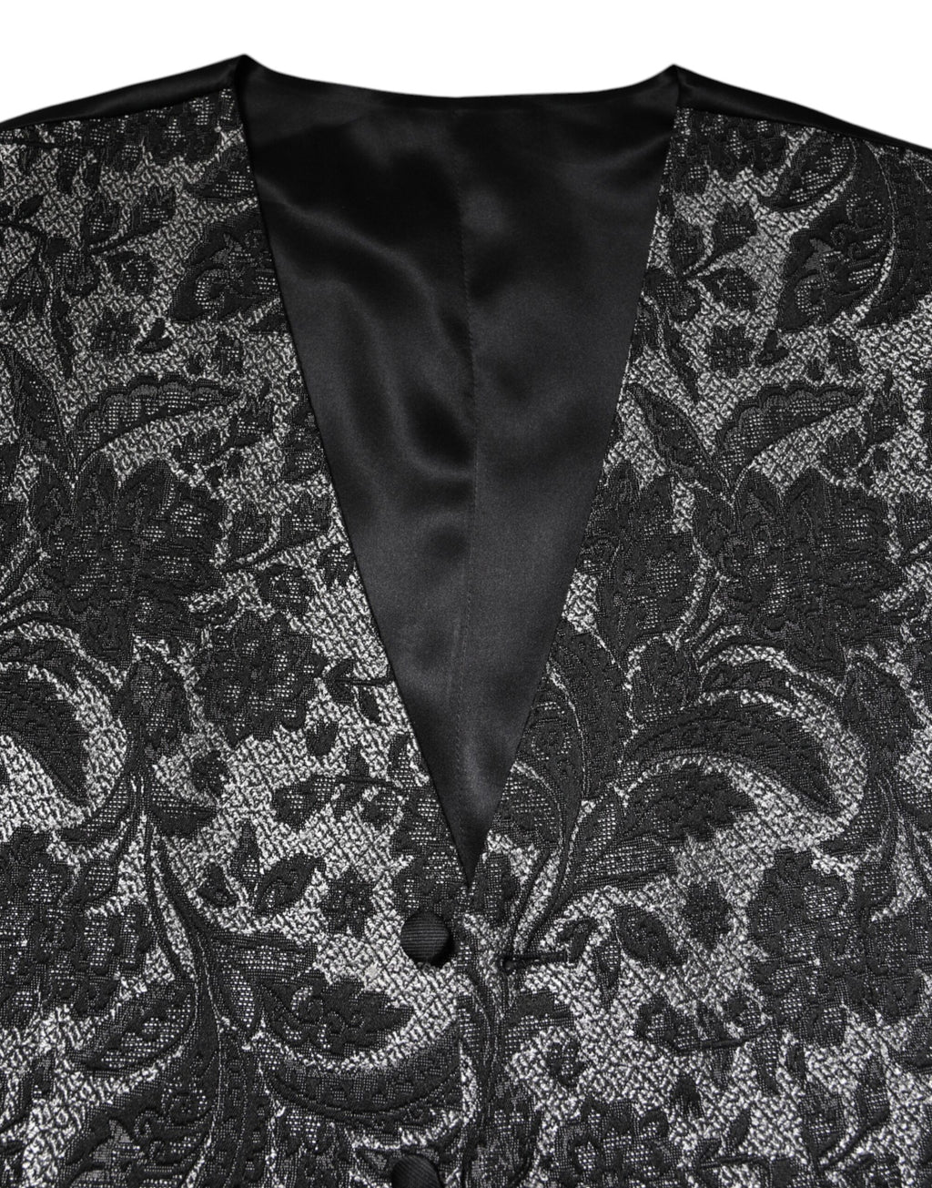 Gilet formel homme Dolce & Gabbana en brocart noir et gris, avec détails élégants pour occasion spéciale.