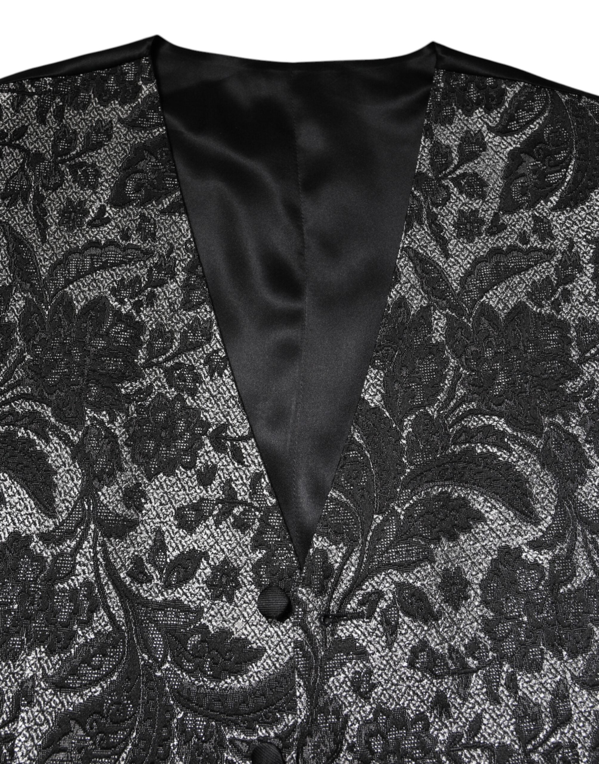 Gilet formel homme Dolce & Gabbana en brocart noir et gris, avec détails élégants pour occasion spéciale.