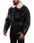 Manteau noir en cuir et shearling de moto Dolce & Gabbana, veste élégante avec détails en cuir et doublure en laine.