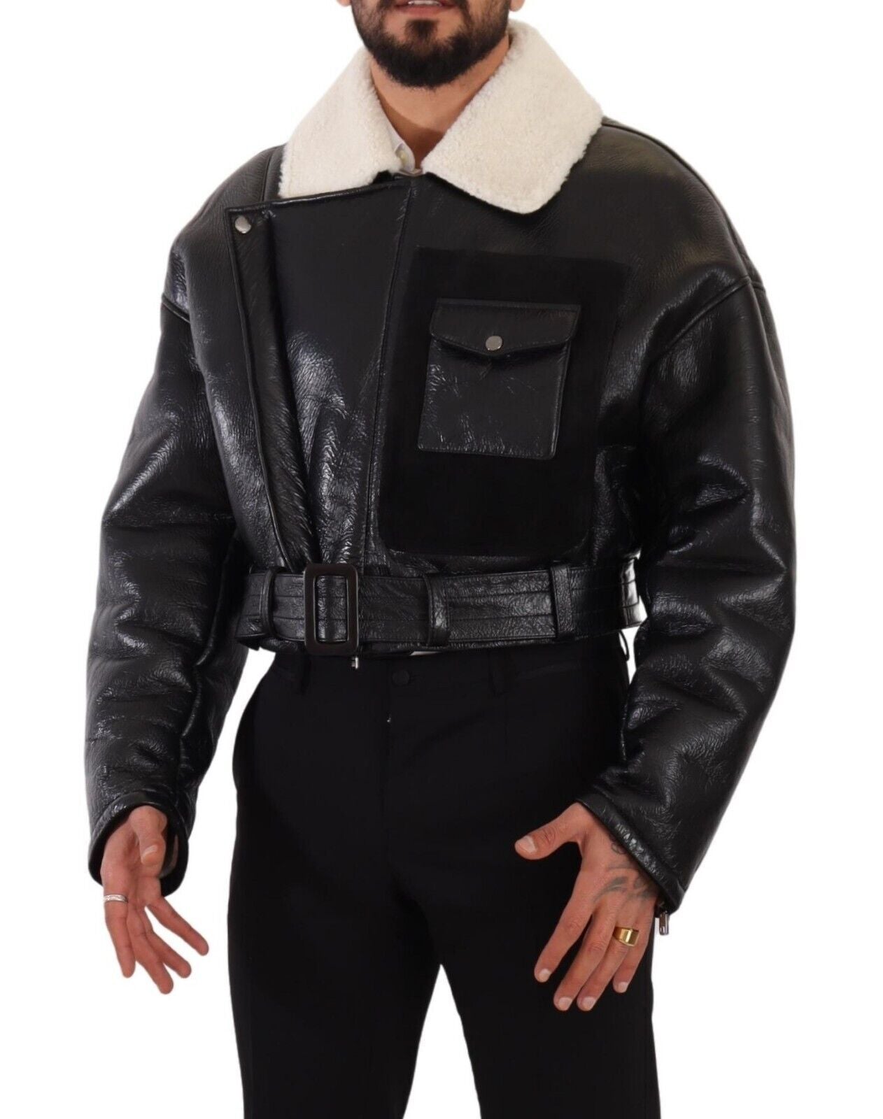 Veste en cuir noir Dolce & Gabbana à col en shearling, manteau biker élégant avec détails en peau retournée.