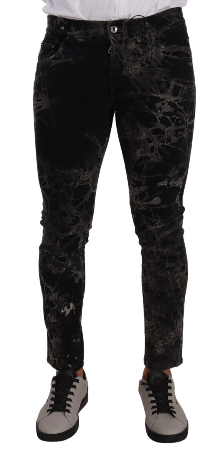 Jeans slim noir à motif de Dolce & Gabbana, coupe skinny, en denim avec détails sophistiqués, pour un style élégant et moderne.