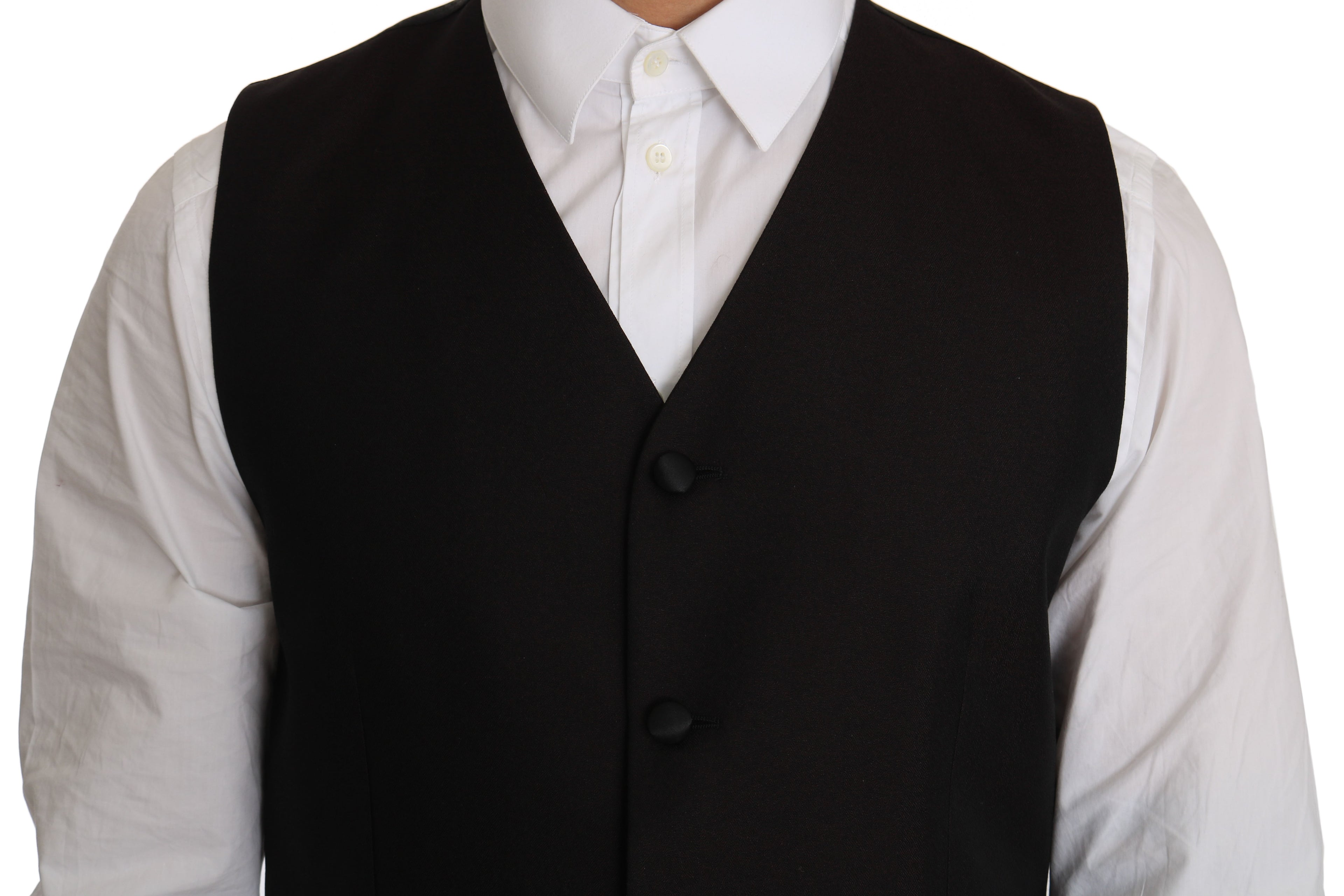 Gilet noir en soie Dolce & Gabbana, coupe élégante, porté sur un mannequin, détails de couture visibles.