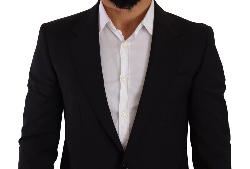 Gilet noir slim fit Dolce & Gabbana avec deux boutons et design Martini blazer, porté sur mannequin.