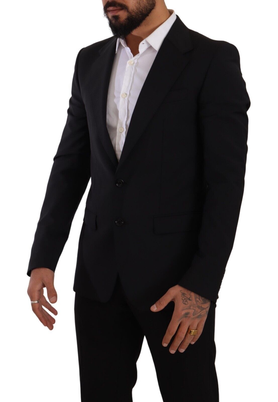 Gilet noir Dolce & Gabbana ajusté à deux boutons, style Martini blazer, porté sur un mannequin dans une image élégante.