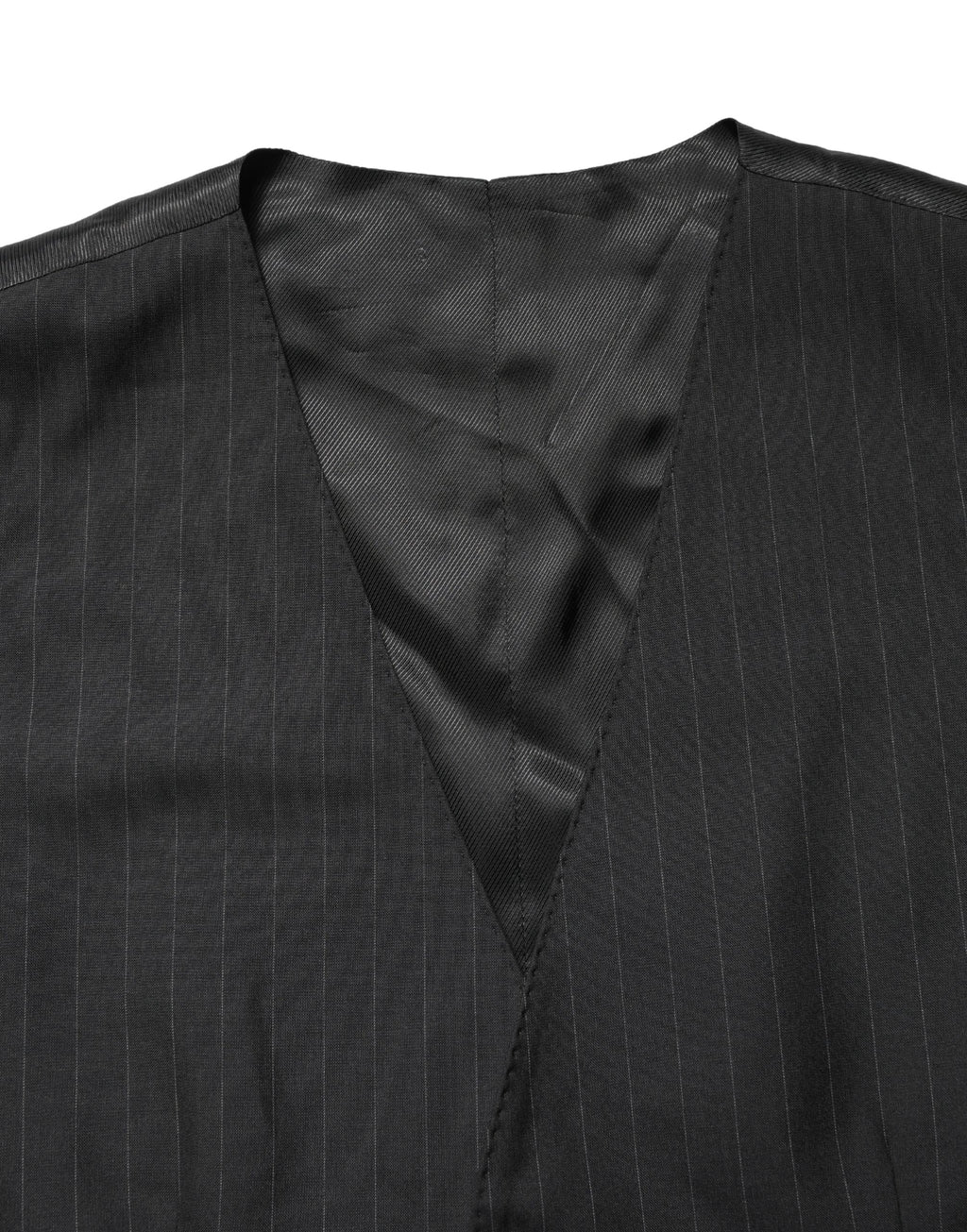Gilet noir à rayures Dolce & Gabbana à simple boutonnage, en tissu élégant, porté sur un mannequin.