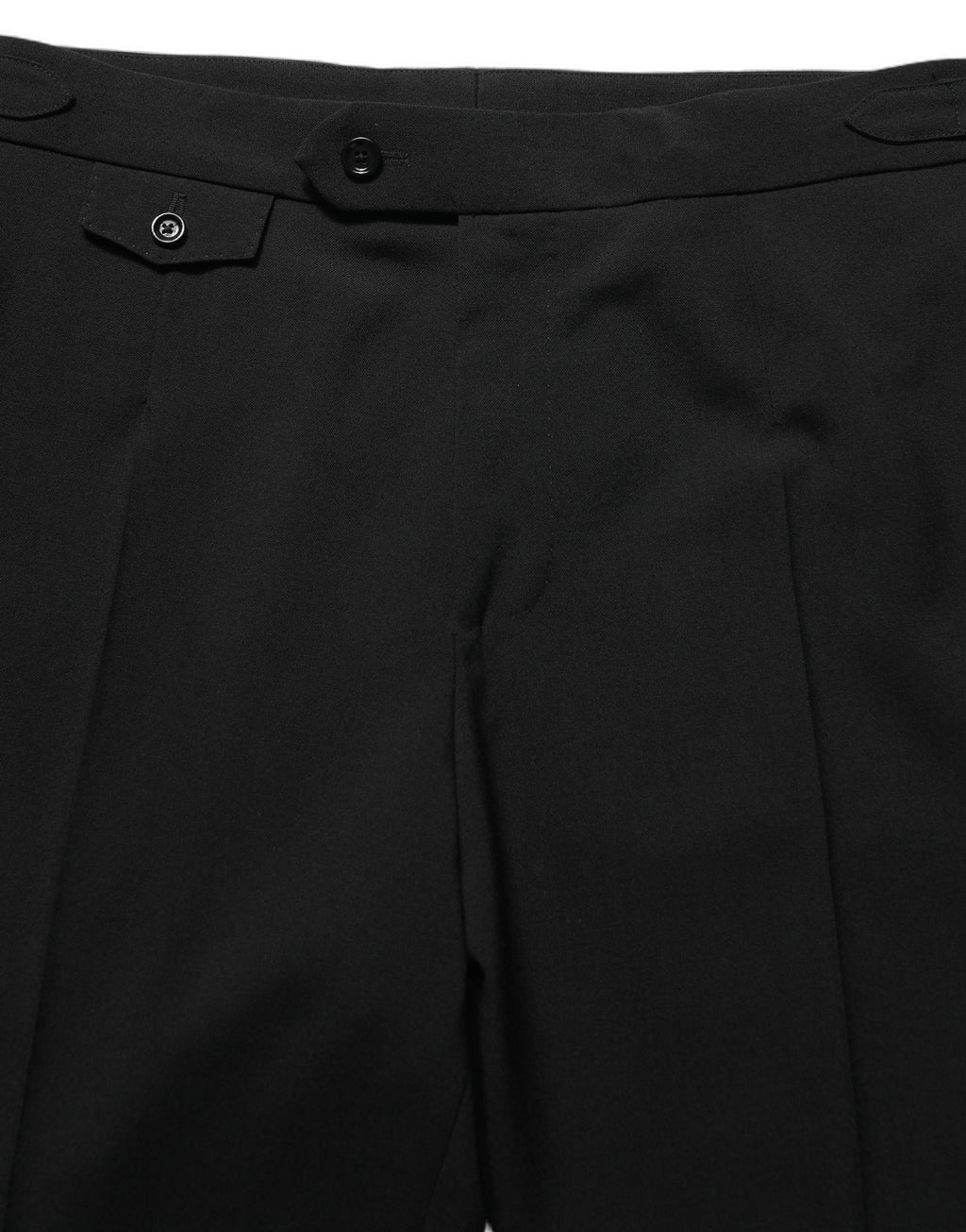 Pantalon homme Dolce & Gabbana noir à coupe tapered, pantalon de costume élégant avec poches latérales et couture soignée.