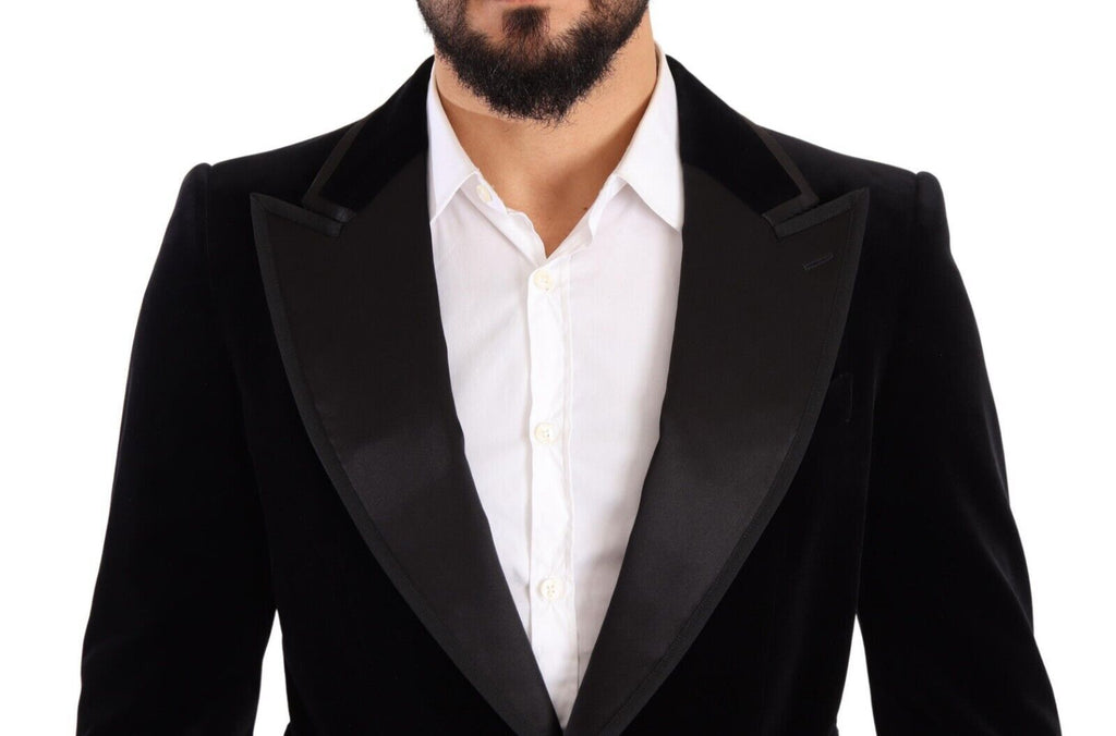 Blazer noir en velours Dolce & Gabbana à un bouton, coupe classique et élégante, porté sur un mannequin.