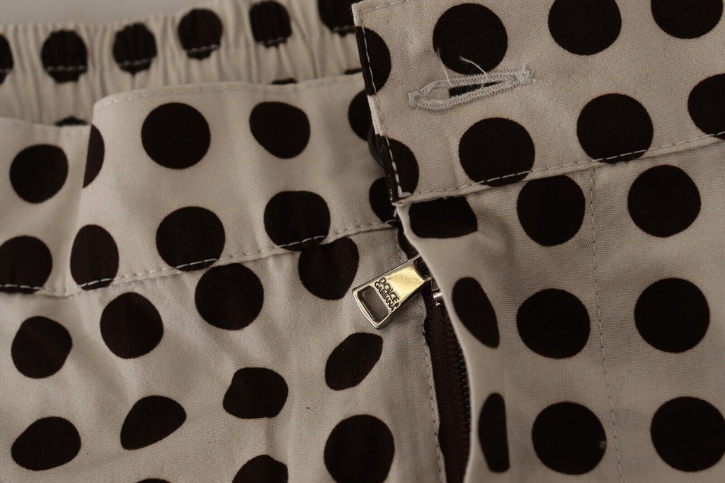 Shorts en coton et lin noirs et blancs à pois de Dolce & Gabbana, style décontracté et élégant.