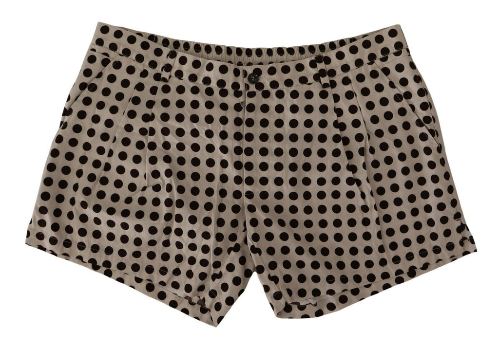 Shorts en coton et lin à pois noirs et blancs de Dolce & Gabbana, style décontracté et élégant.