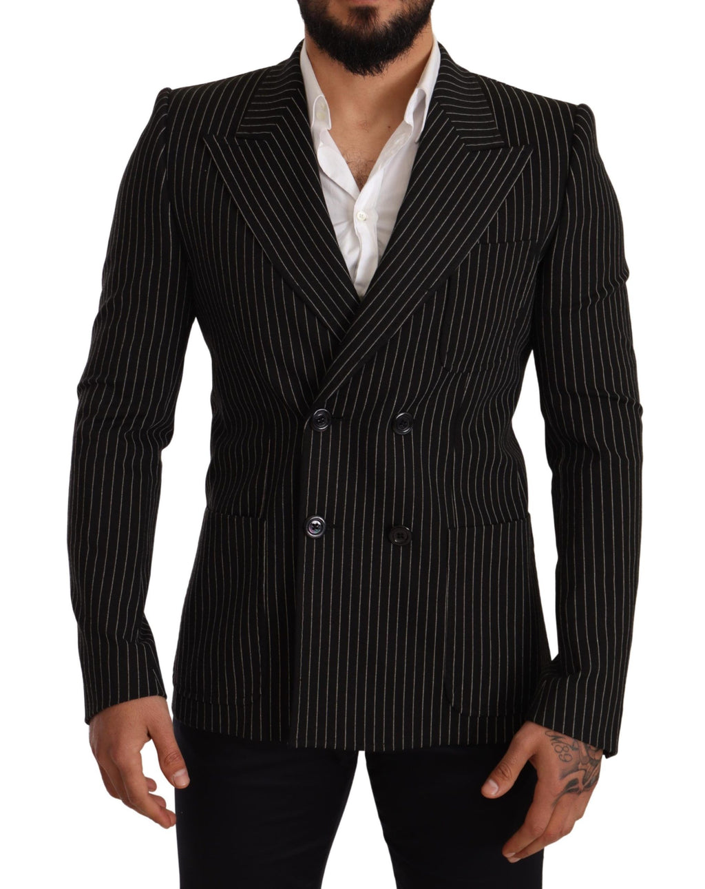 Manteau blazer noir et blanc à rayures, coupe slim fit, de la marque Dolce & Gabbana, porté sur un mannequin.