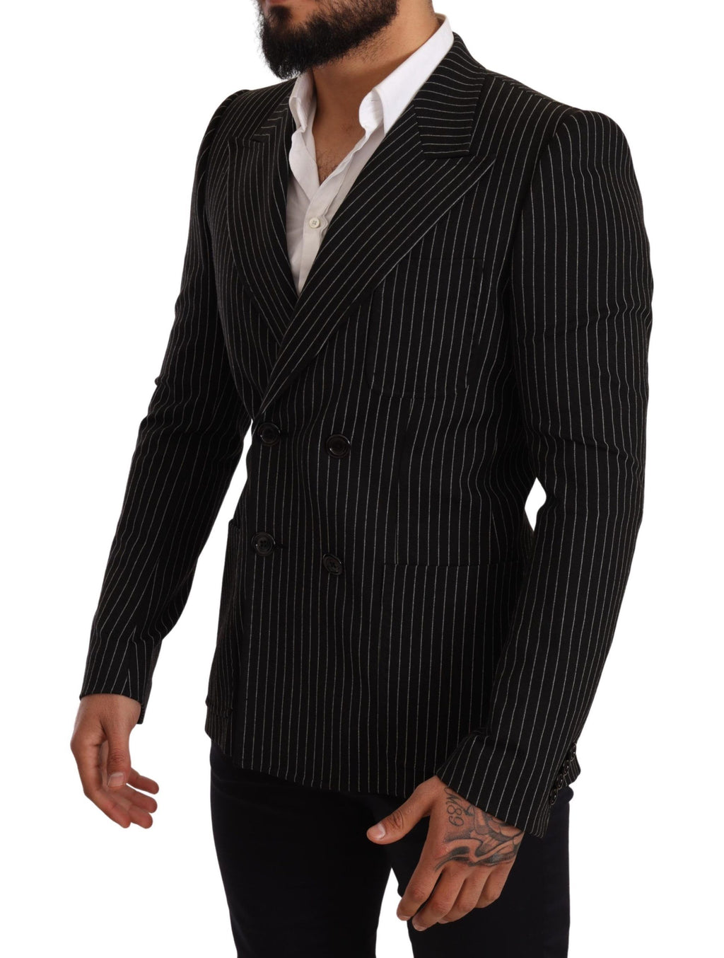 Manteau blazer slim noir et blanc à rayures de Dolce & Gabbana, coupe ajustée et élégante, porté sur un mannequin.