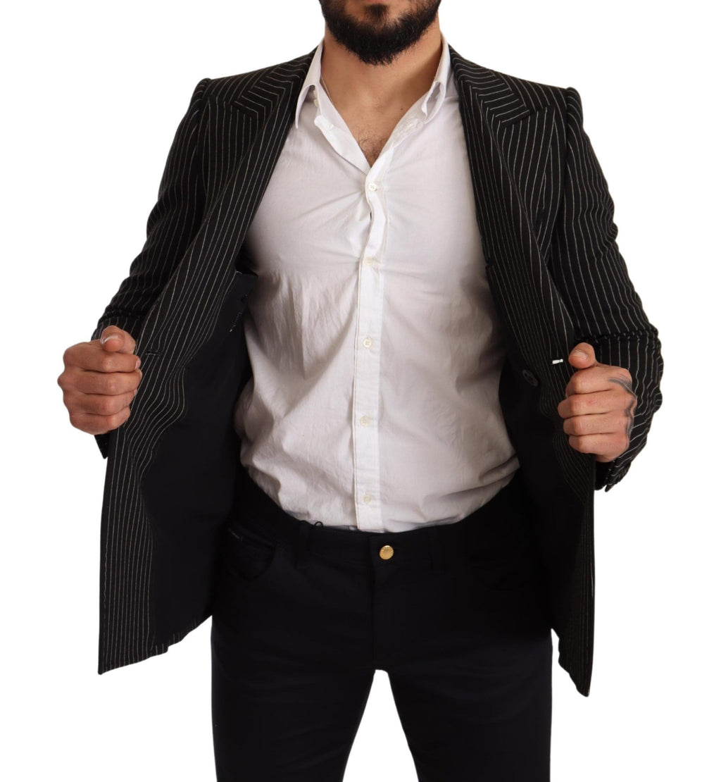 Manteau blazer slim noir et blanc à rayures de Dolce & Gabbana, ajusté et élégant, porté sur un mannequin.
