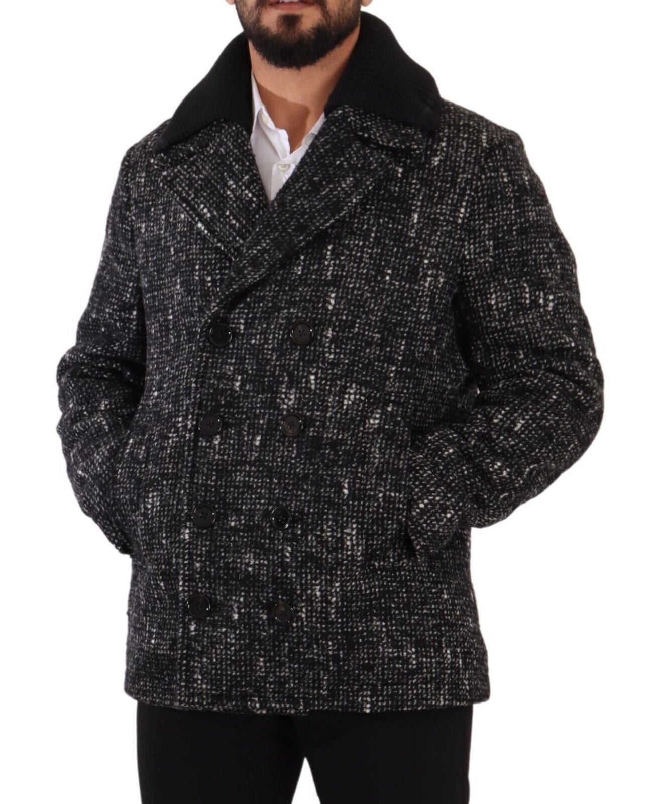 Manteau homme Dolce & Gabbana en laine noire, à double boutonnage, style élégant et chaud, porté sur un mannequin.