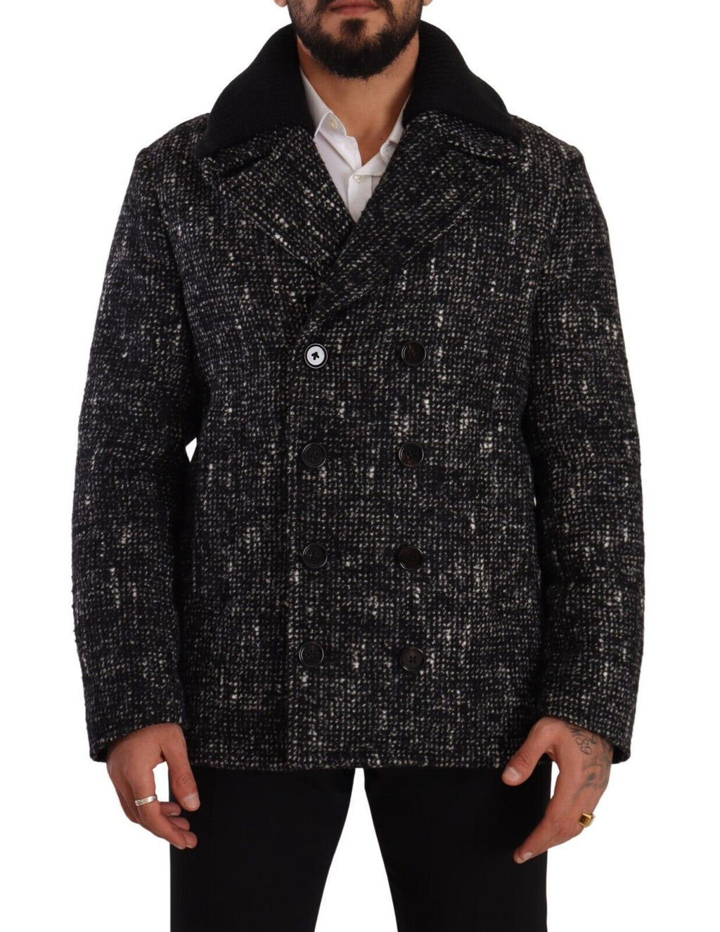 Manteau homme en laine noire Dolce & Gabbana, double boutonnage, coupe élégante et classique, porté sur un mannequin.