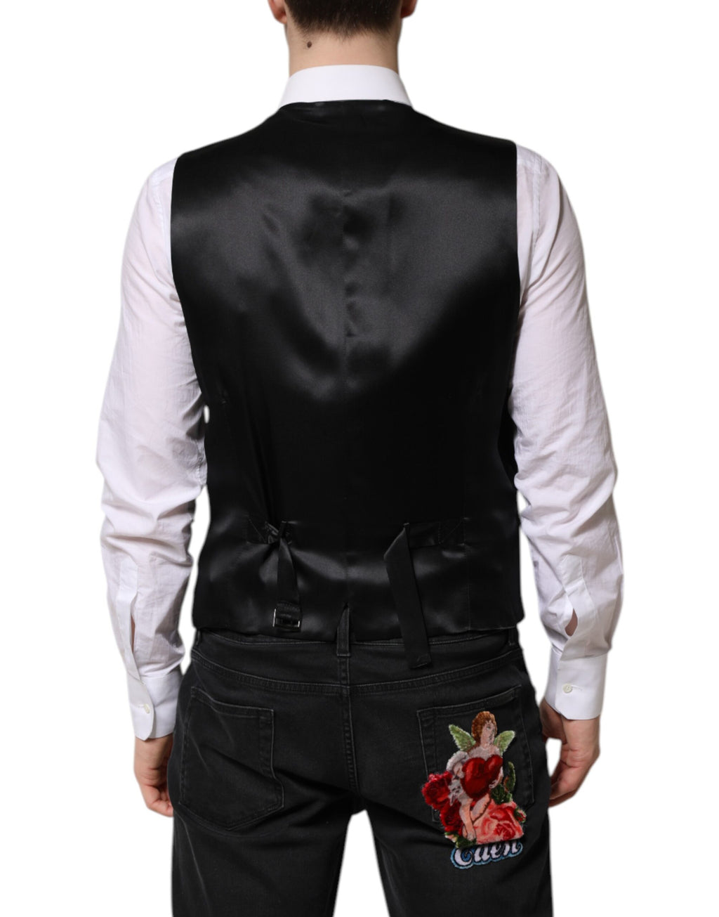 Gilet noir en laine Dolce & Gabbana pour homme, vêtement formel, ajusté avec col en V et boutons.
