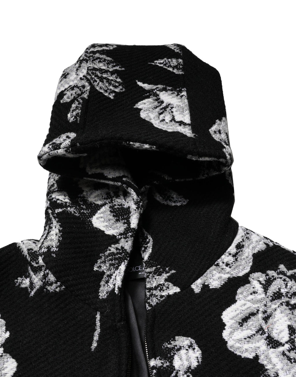 Veste à capuche en laine noire à imprimé floral Dolce & Gabbana pour homme, détails de design élégants et couture de luxe.