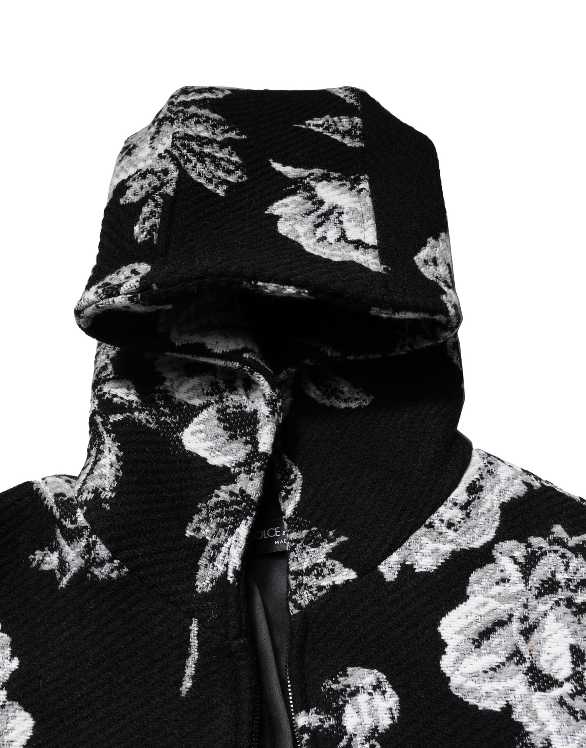 Veste à capuche en laine noire à imprimé floral Dolce & Gabbana pour homme, détails de design élégants et couture de luxe.