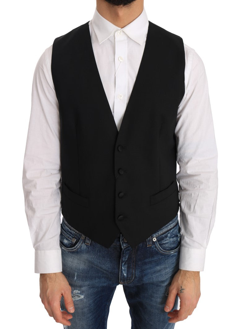 Gilet en laine et soie noir de Dolce & Gabbana, veste élégante avec détails sophistiqués, porté sur un mannequin.