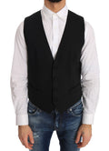 Gilet en laine et soie noir de Dolce & Gabbana, veste élégante avec détails sophistiqués, porté sur un mannequin.