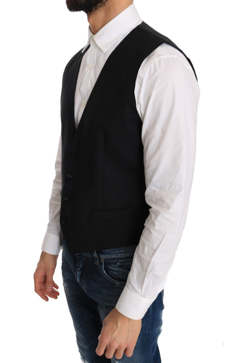 Gilet en laine et soie noir Dolce & Gabbana porté sur un mannequin, détail élégant et texture raffinée.