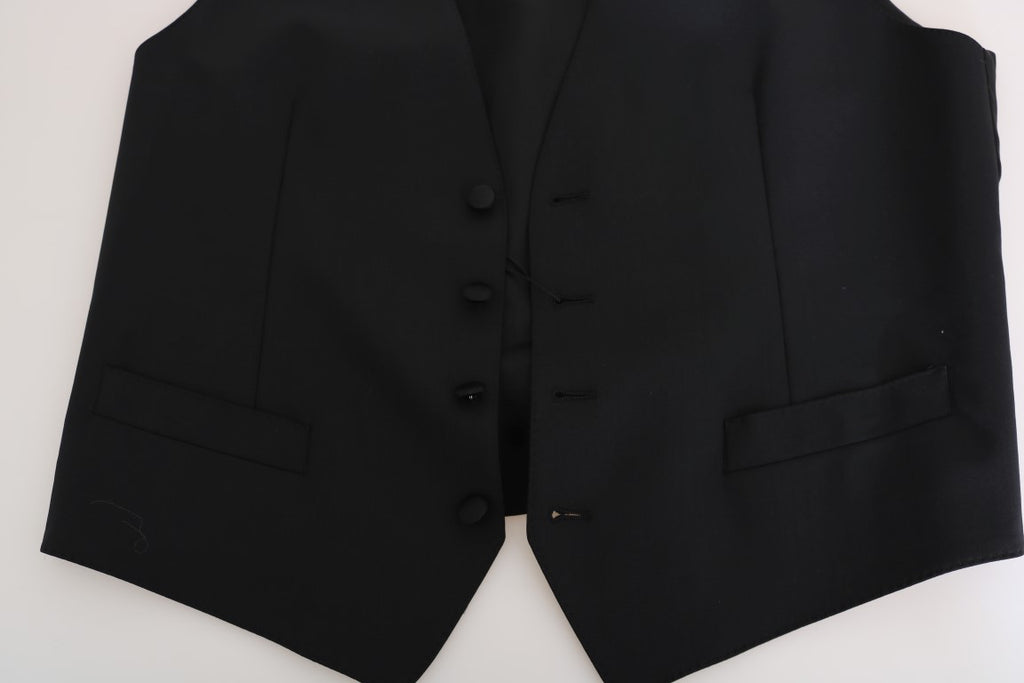 Gilet en laine et soie noir Dolce & Gabbana porté sur un mannequin, détail de finition élégant et tissu luxueux.