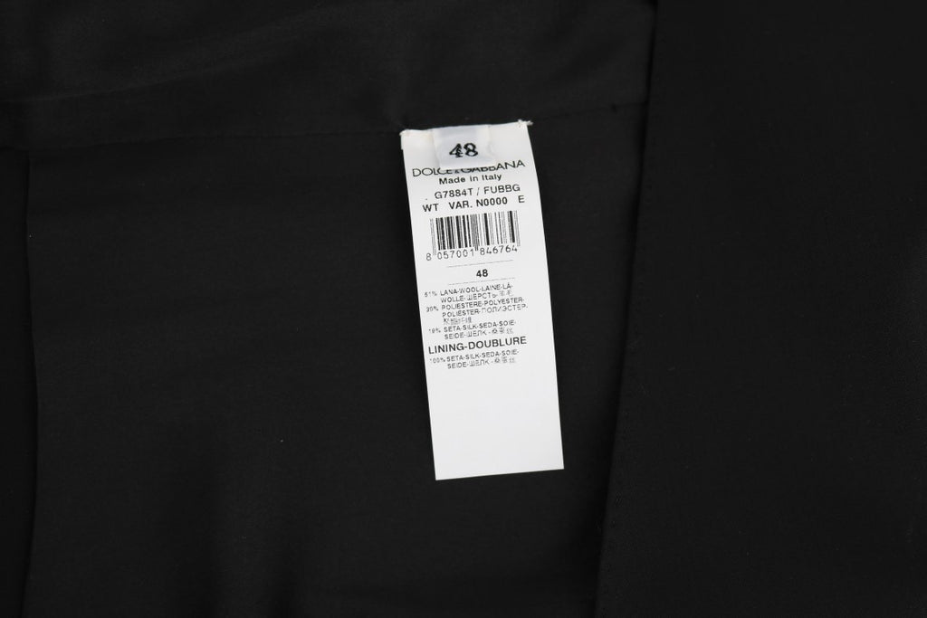 Gilet en laine et soie noire de Dolce & Gabbana, élégant et sophistiqué, porté sur un mannequin.