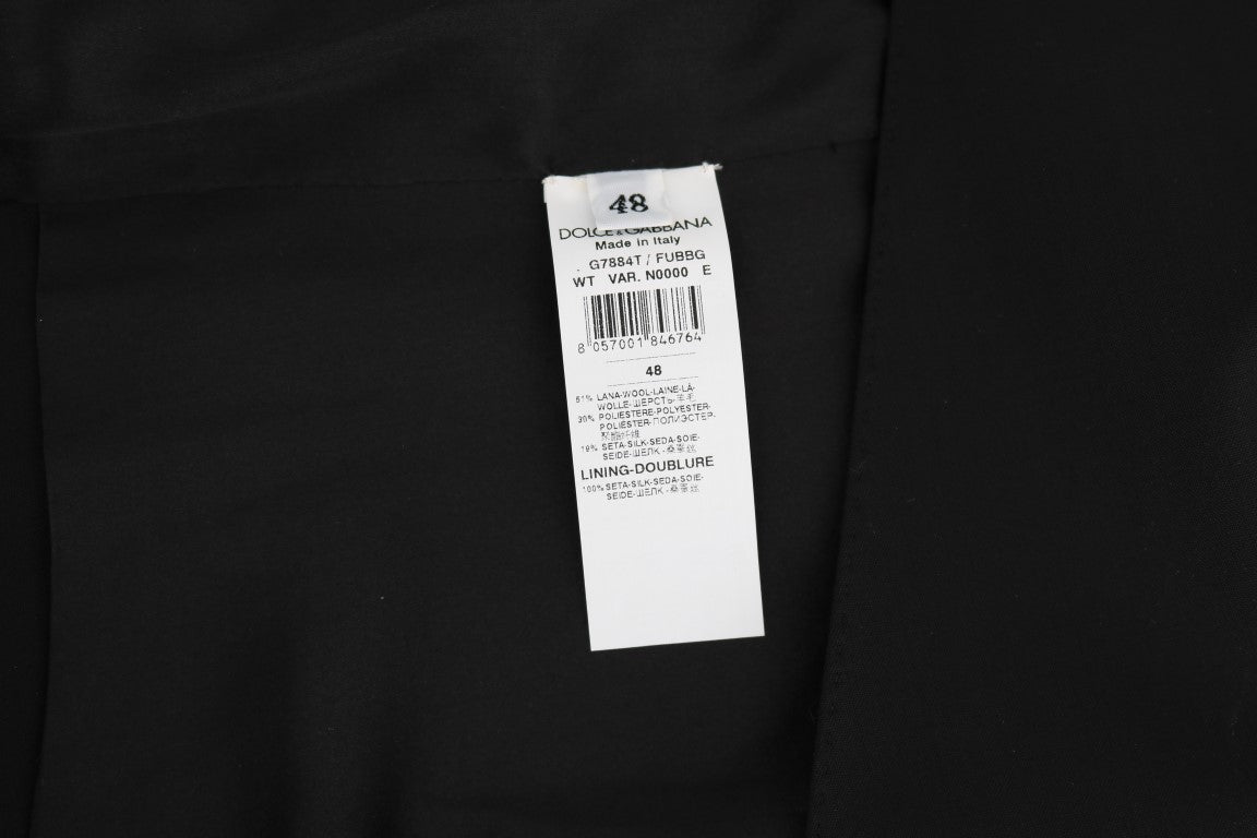 Gilet en laine et soie noire de Dolce & Gabbana, élégant et sophistiqué, porté sur un mannequin.