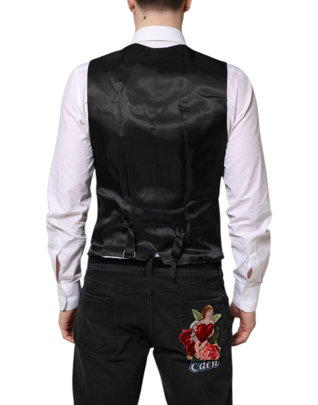 Gilet noir en laine Dolce & Gabbana, robe waistcoat formelle élégante et ajustée, détails sophistiqués et finition soignée.