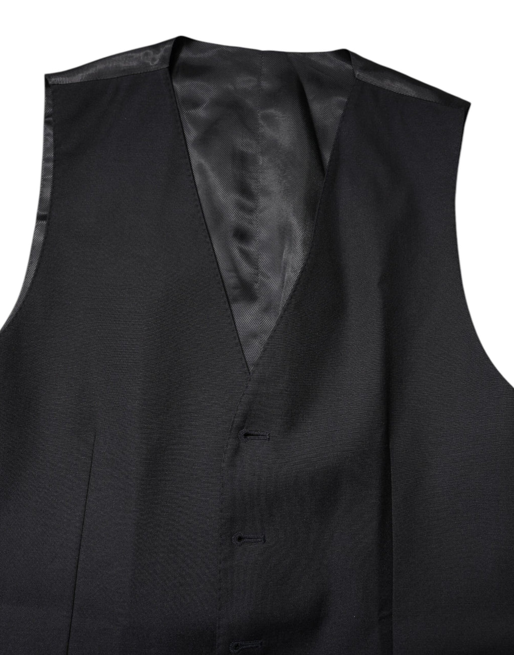 Gilet formel en laine noire Dolce & Gabbana, robe portefeuille élégante, ajustée et sophistiquée.
