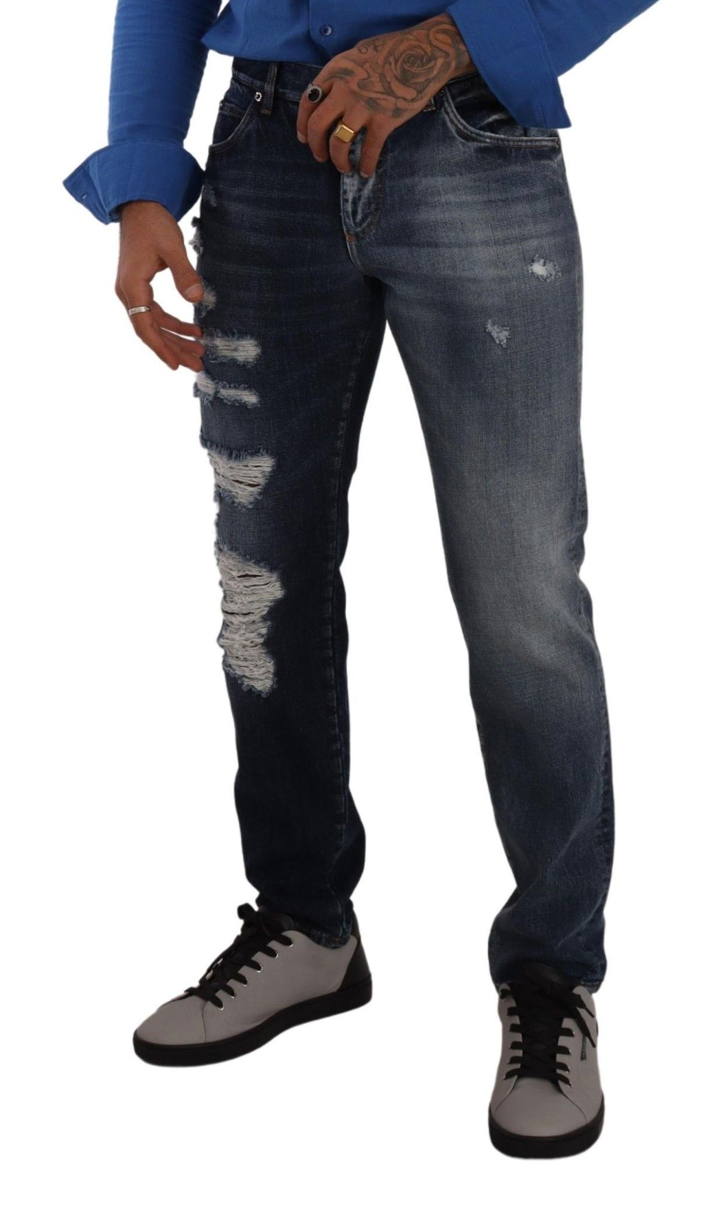 Jeans en denim bleu Dolce & Gabbana, coupe régulière en coton, pantalons décontractés avec poches et fermeture éclair visible.