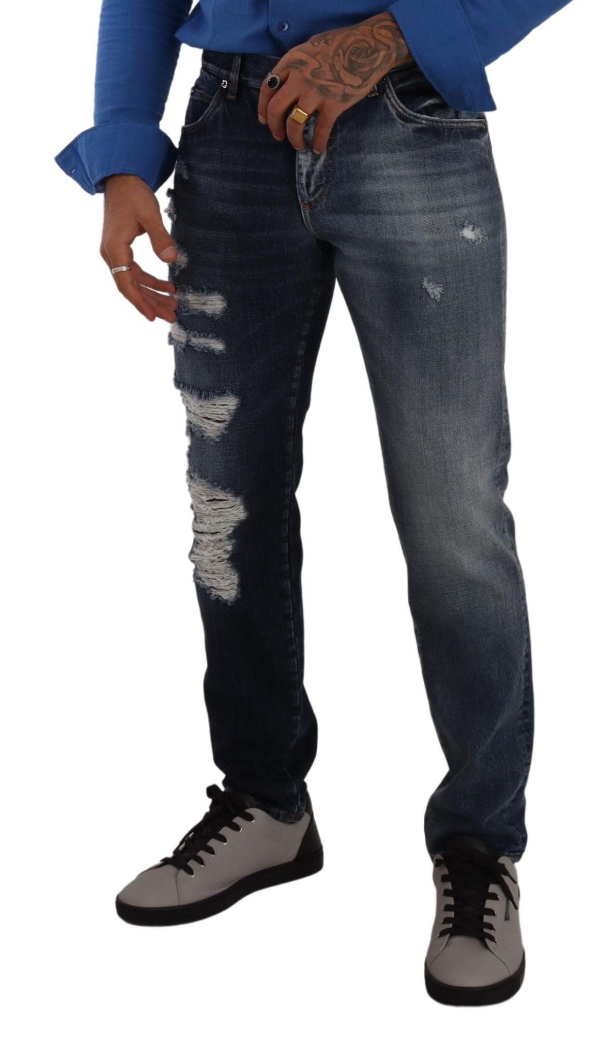 Jeans en denim bleu Dolce & Gabbana, coupe régulière en coton, pantalons décontractés avec poches et fermeture éclair visible.
