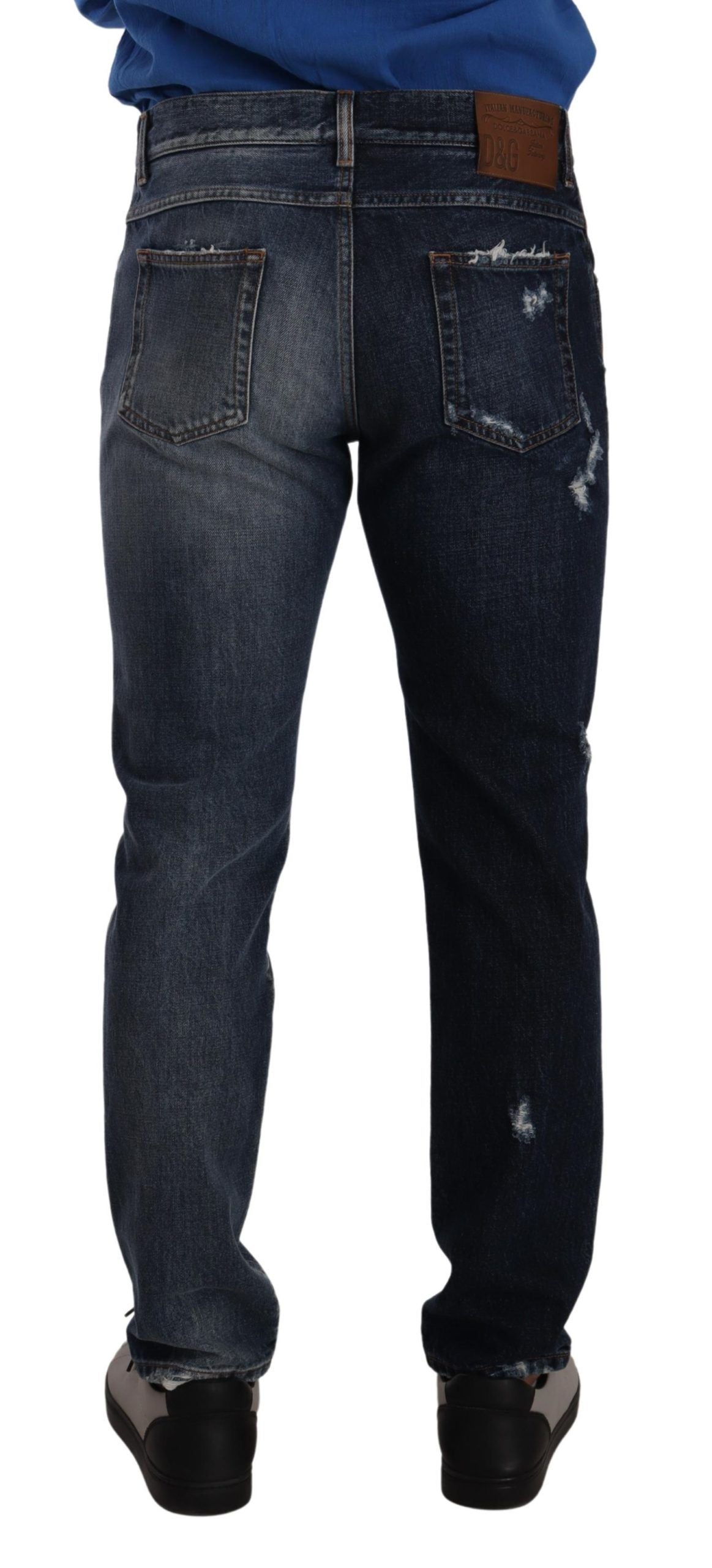 Pantalon en denim bleu Dolce & Gabbana en coton, coupe régulière, vue de face sur un mannequin.